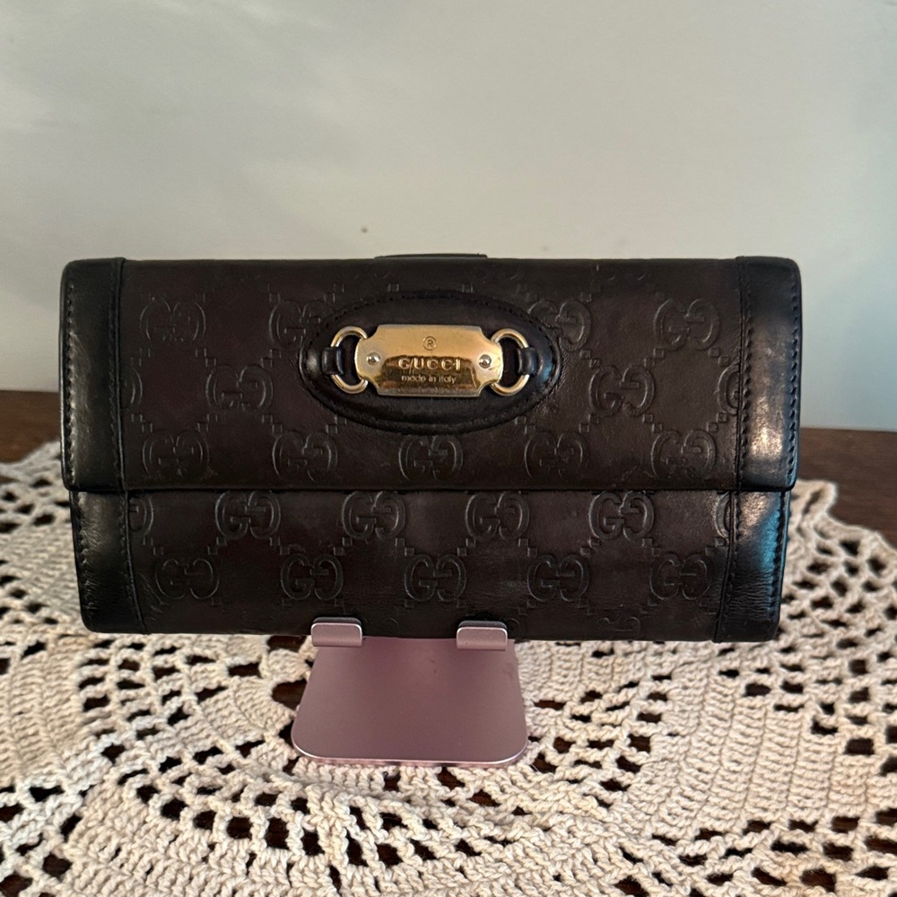 Gucci Dark Leather Embossed Wallet